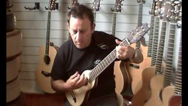 Washburn rover acoustic travel guitar, natural finish strumming